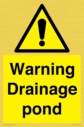 warning-drainage-pond~